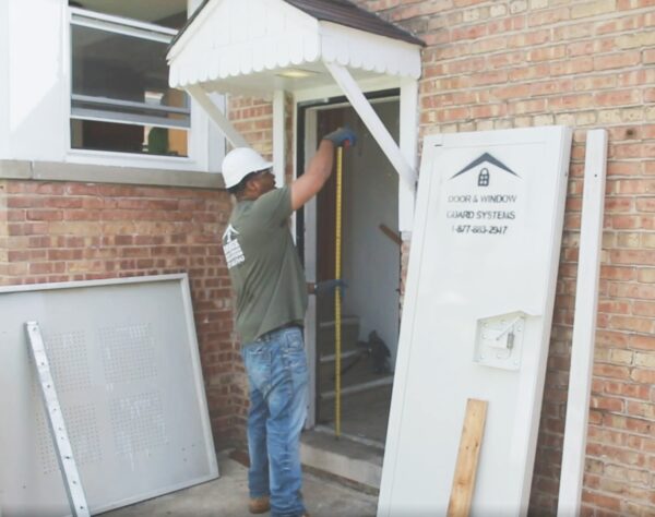 Alternatives to plywood board-up: DAWGS steel door and window guards