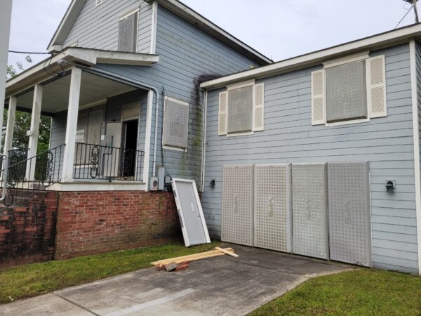 DAWGS door and window guards protecting vacant properties in New Orleans